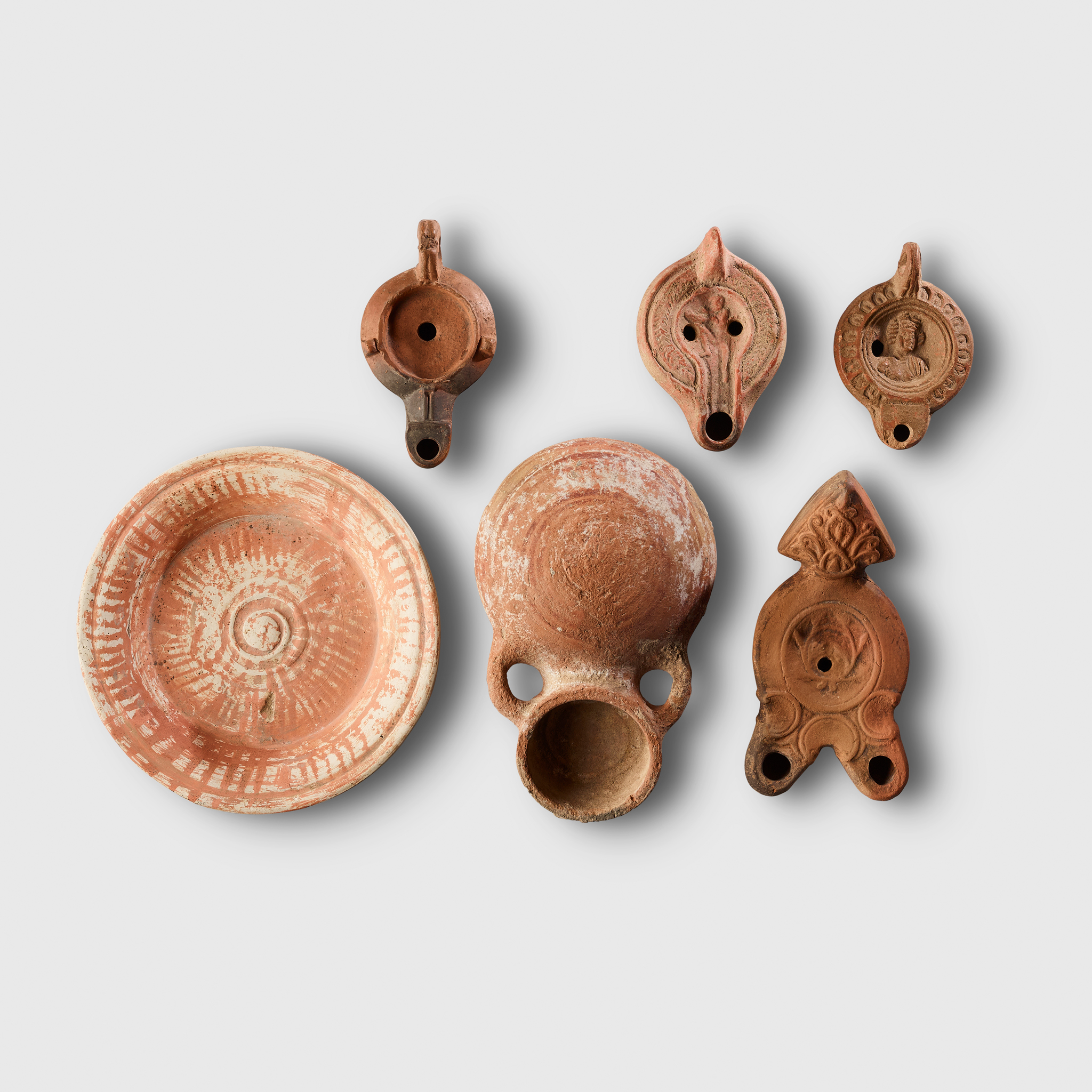 COLLECTION OF ROMAN OIL LAMPS