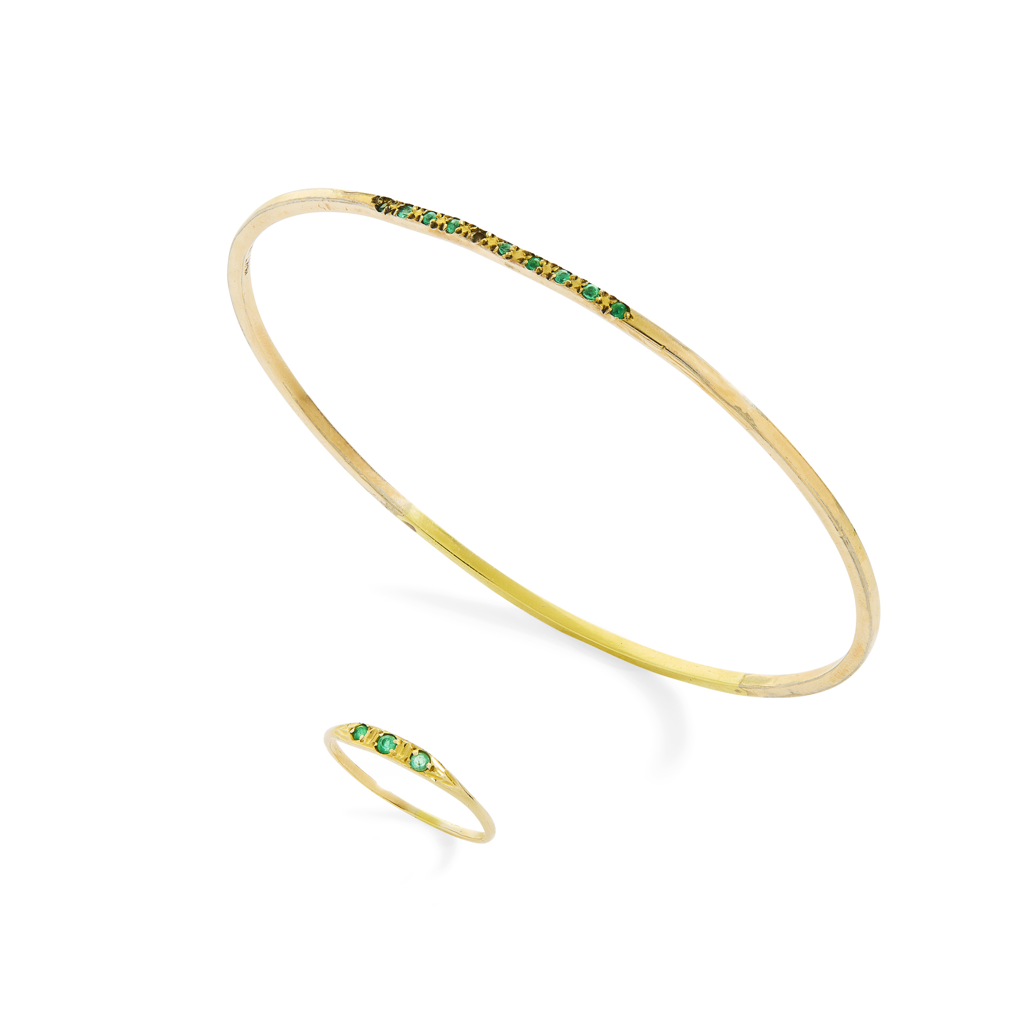 An emerald bangle and ring