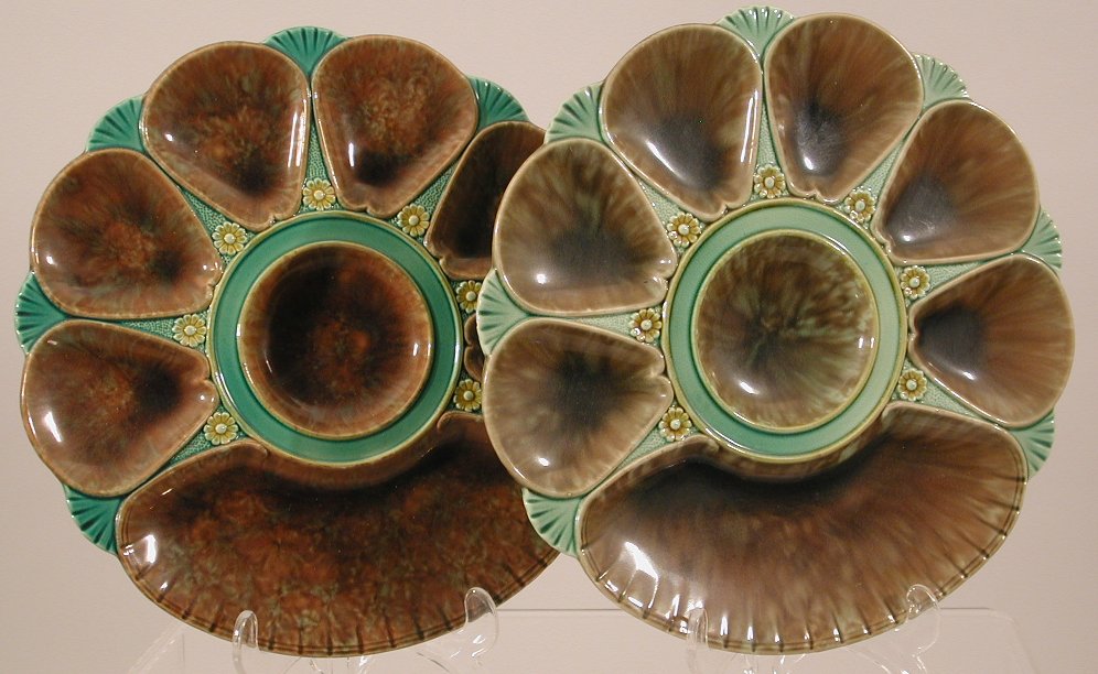 A set of six Minton brown tortoiseshell, green and yellow glazed oyster plates