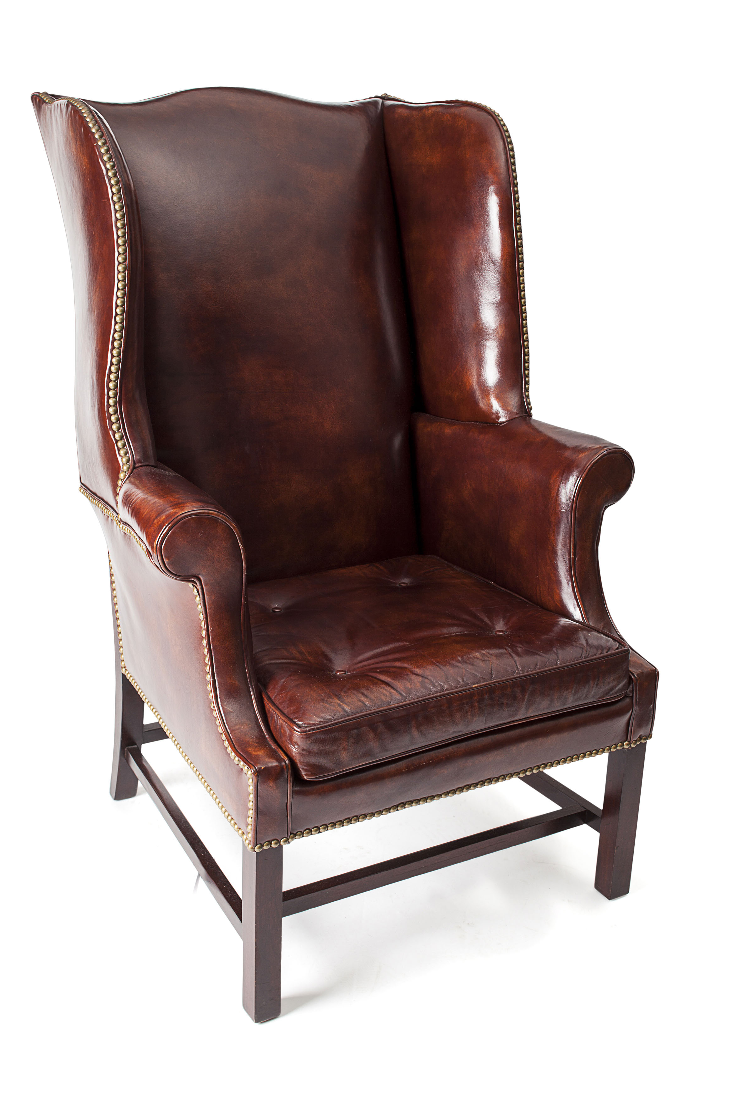 GEORGE III STYLE MAHOGANY UPLHOLSTERED WING ARMCHAIR