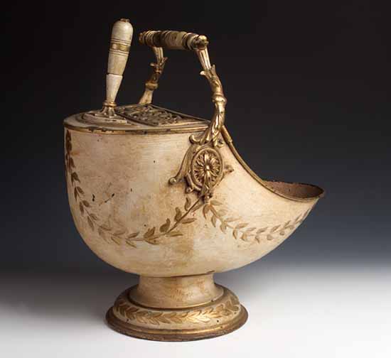 A 19th century tôleware coal helmet