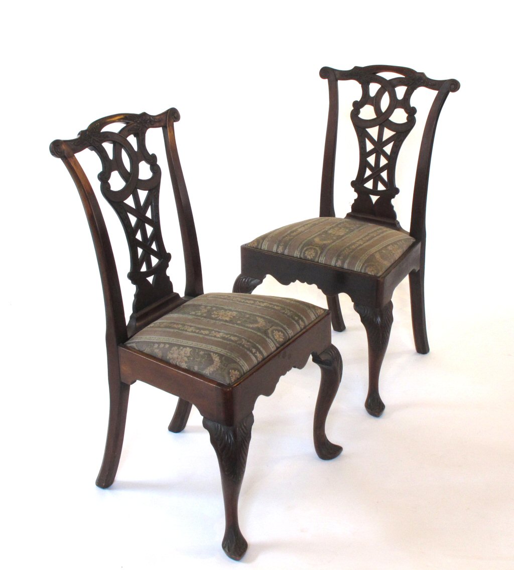 SET OF FOUR S. & H. JEWELL CHIPPENDALE STYLE CARVED MAHOGANY CHAIRS