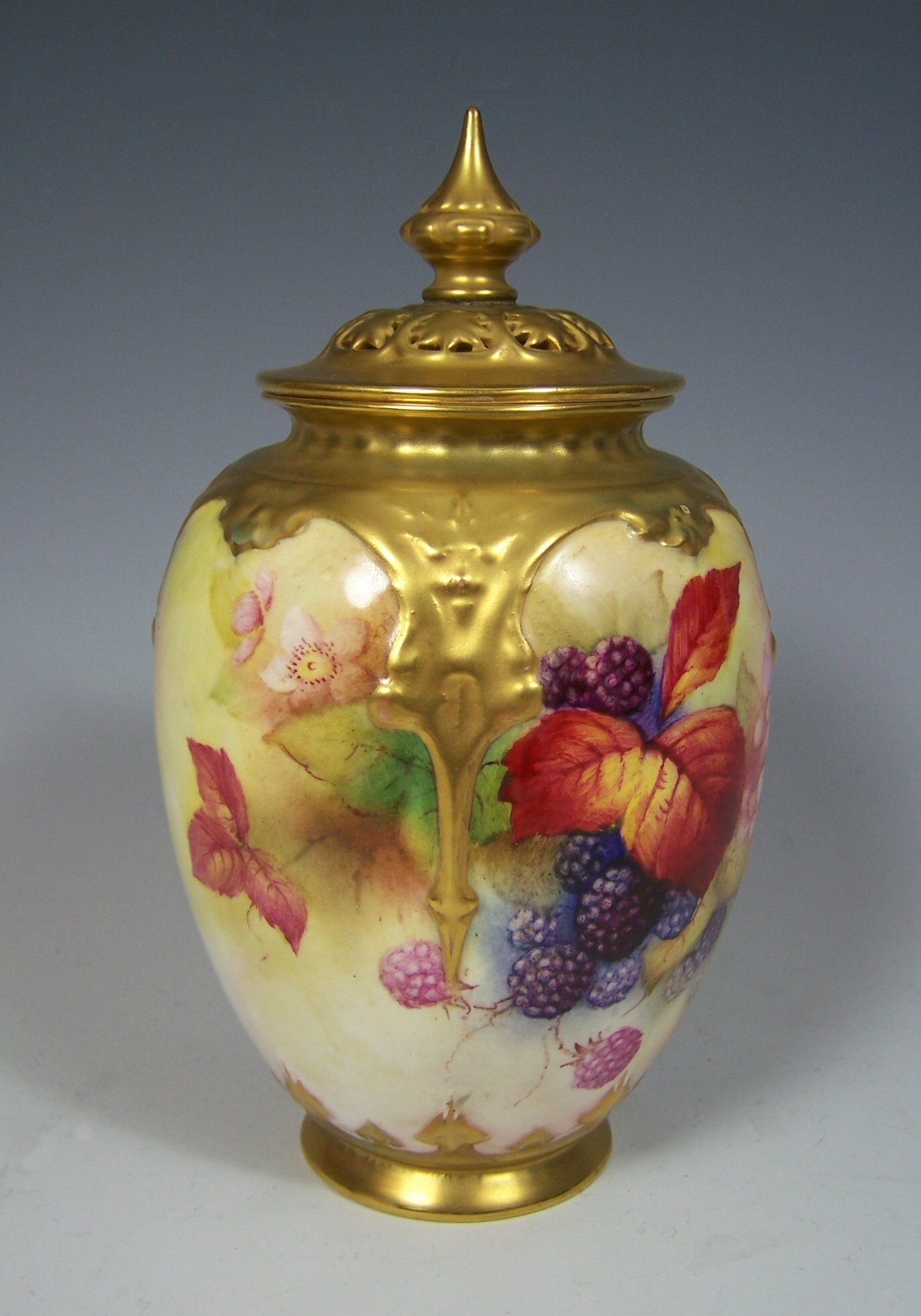 A Royal Worcester vase and cover
