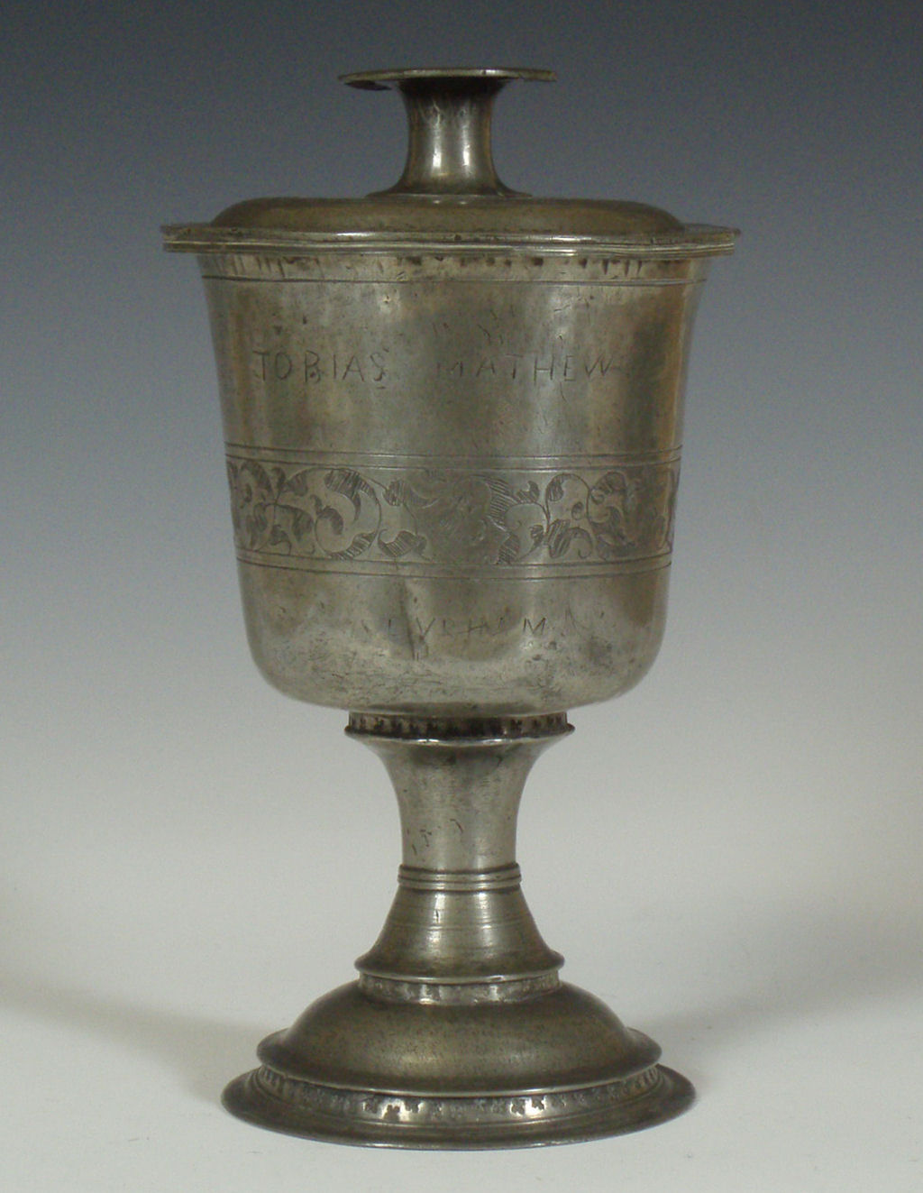 A pewter chalice and cover