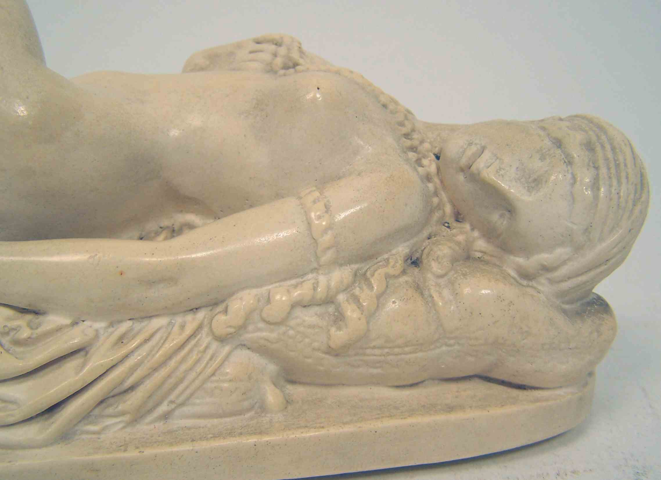 A painted plaster statuette of a reclining Odalisque By Jean-Jacques Pradier, called James Pradier (1790-1852)