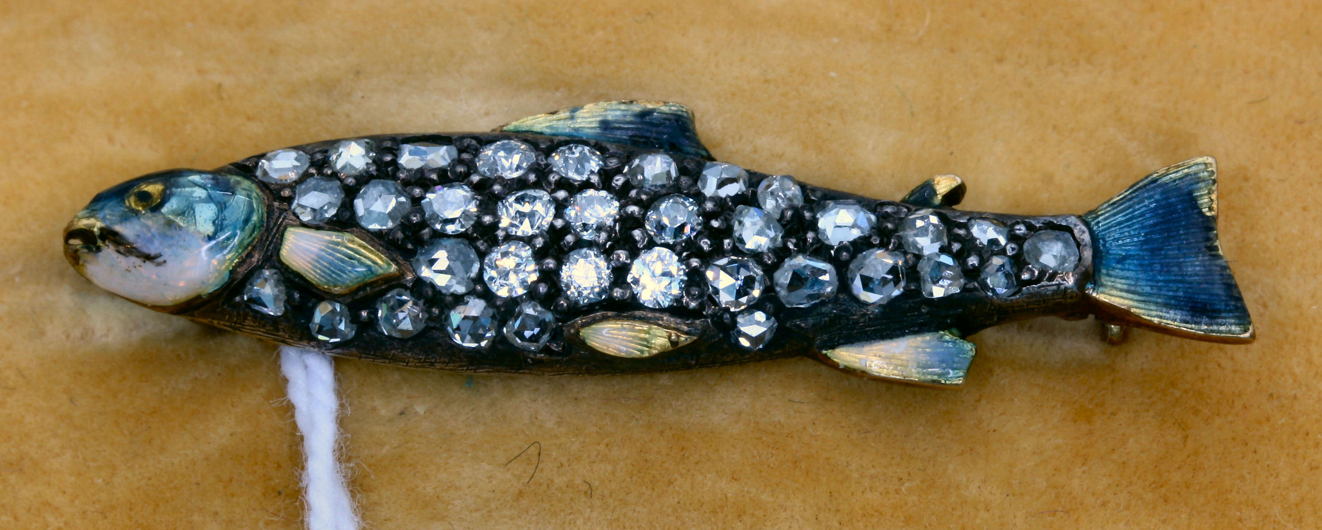 Of Sporting Interest - an enamelled and diamond set novelty brooch,