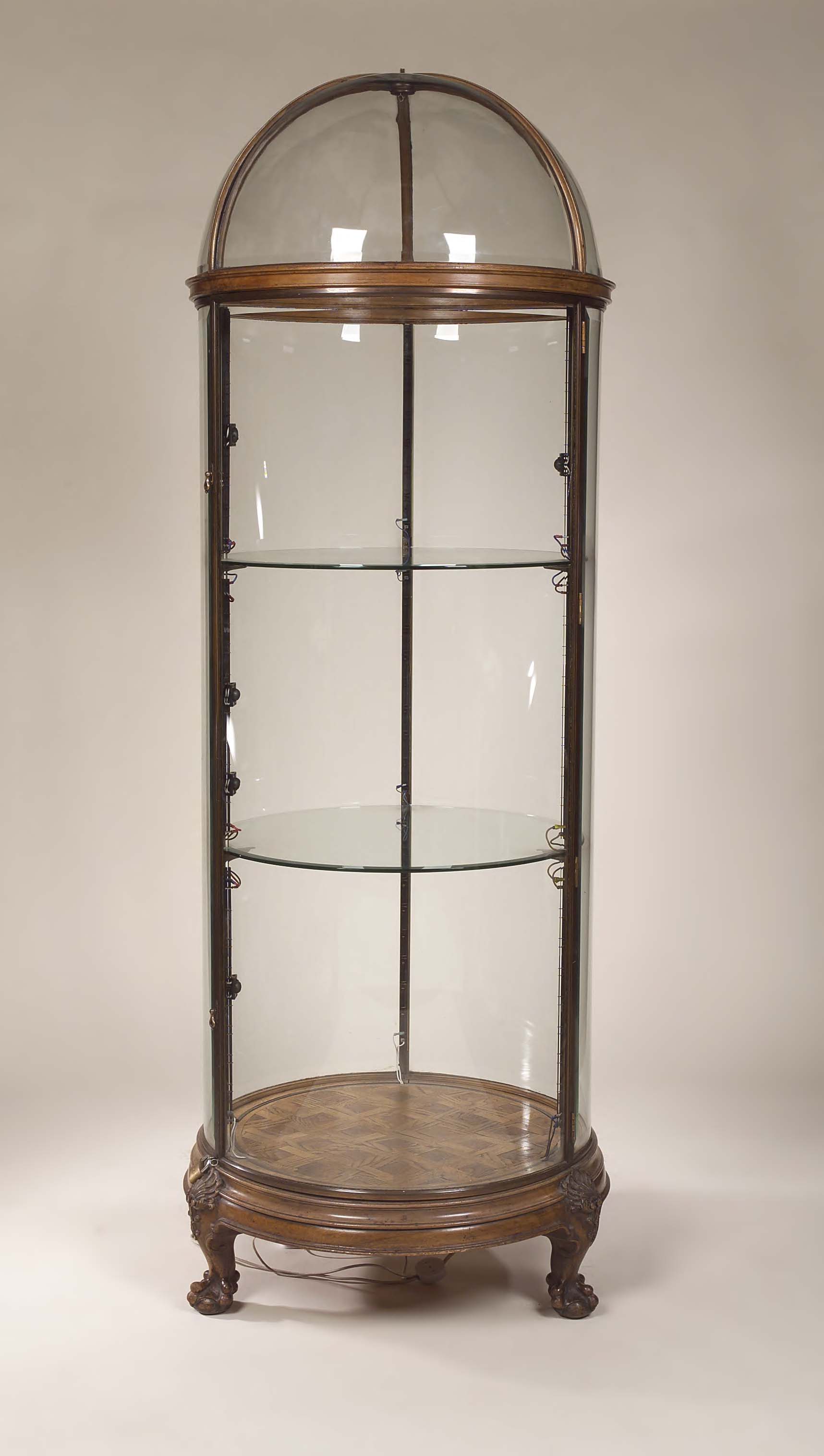 An early 20th century walnut display cabinet,