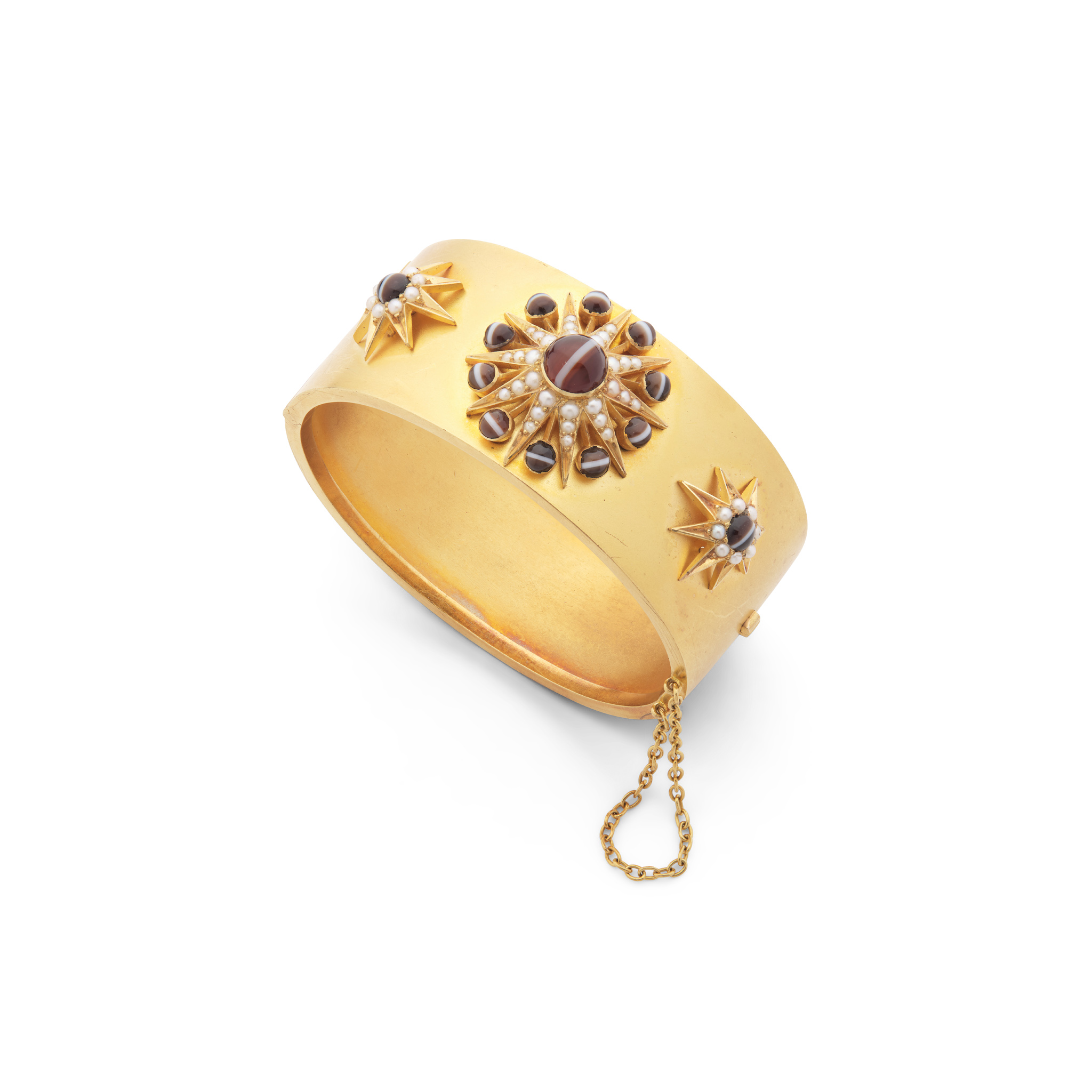 A Victorian agate and seed pearl bangle, circa 1880s