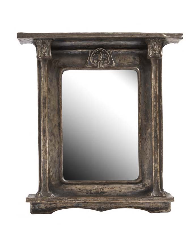 Harold Stabler (1872-1945) An Art Nouveau tin wall mirror,