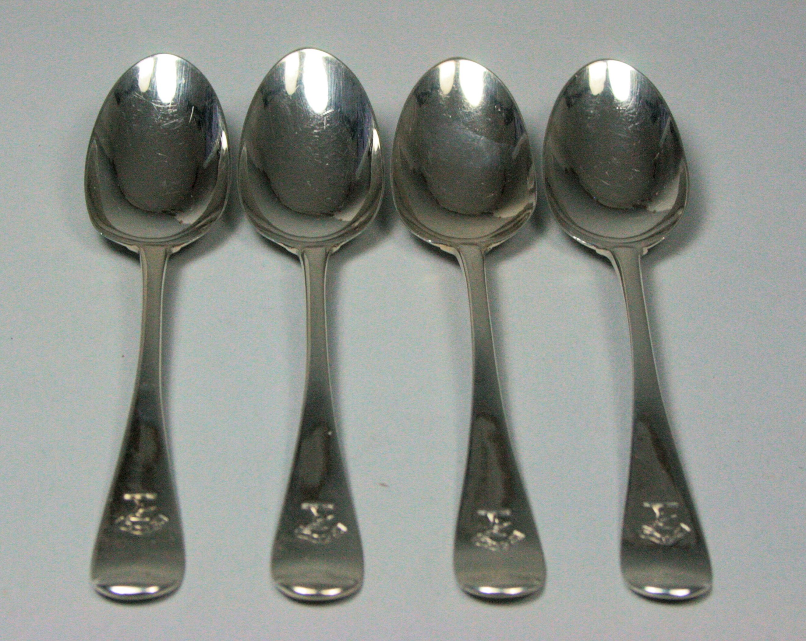 Dundee - a set of four shell back dessert spoons