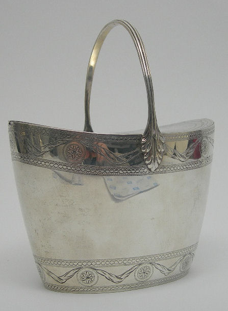 A LATE VICTORIAN SWING-HANDLED LIDDED BOX,