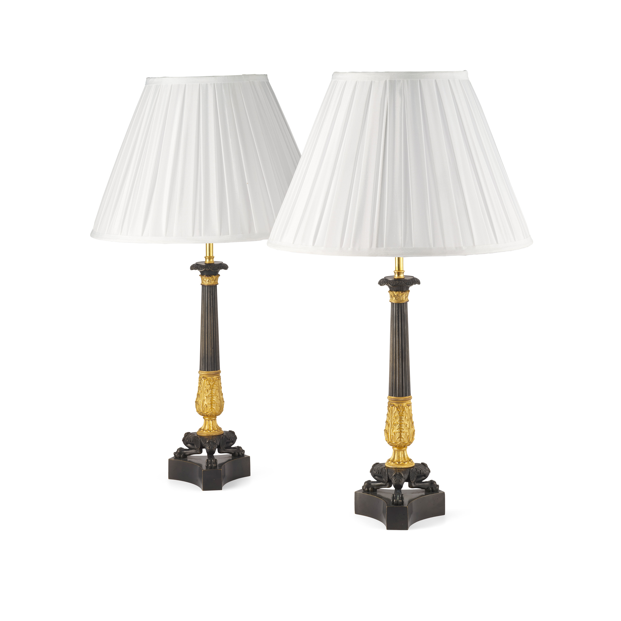 PAIR OF REGENCY STYLE GILT AND PATINATED BRONZE LAMPS