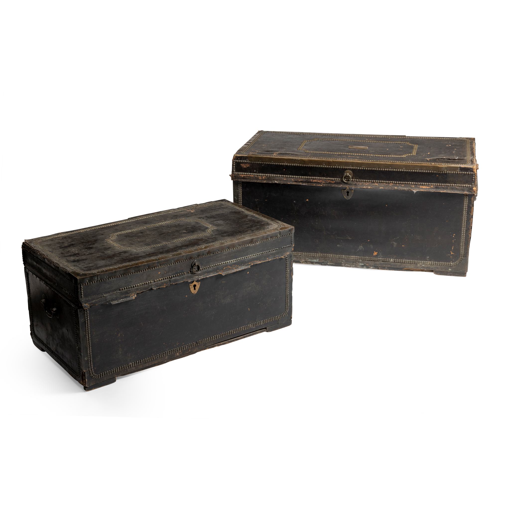 A COLLECTION OF FOUR LEATHER AND BRASS MOUNTED TRUNKS