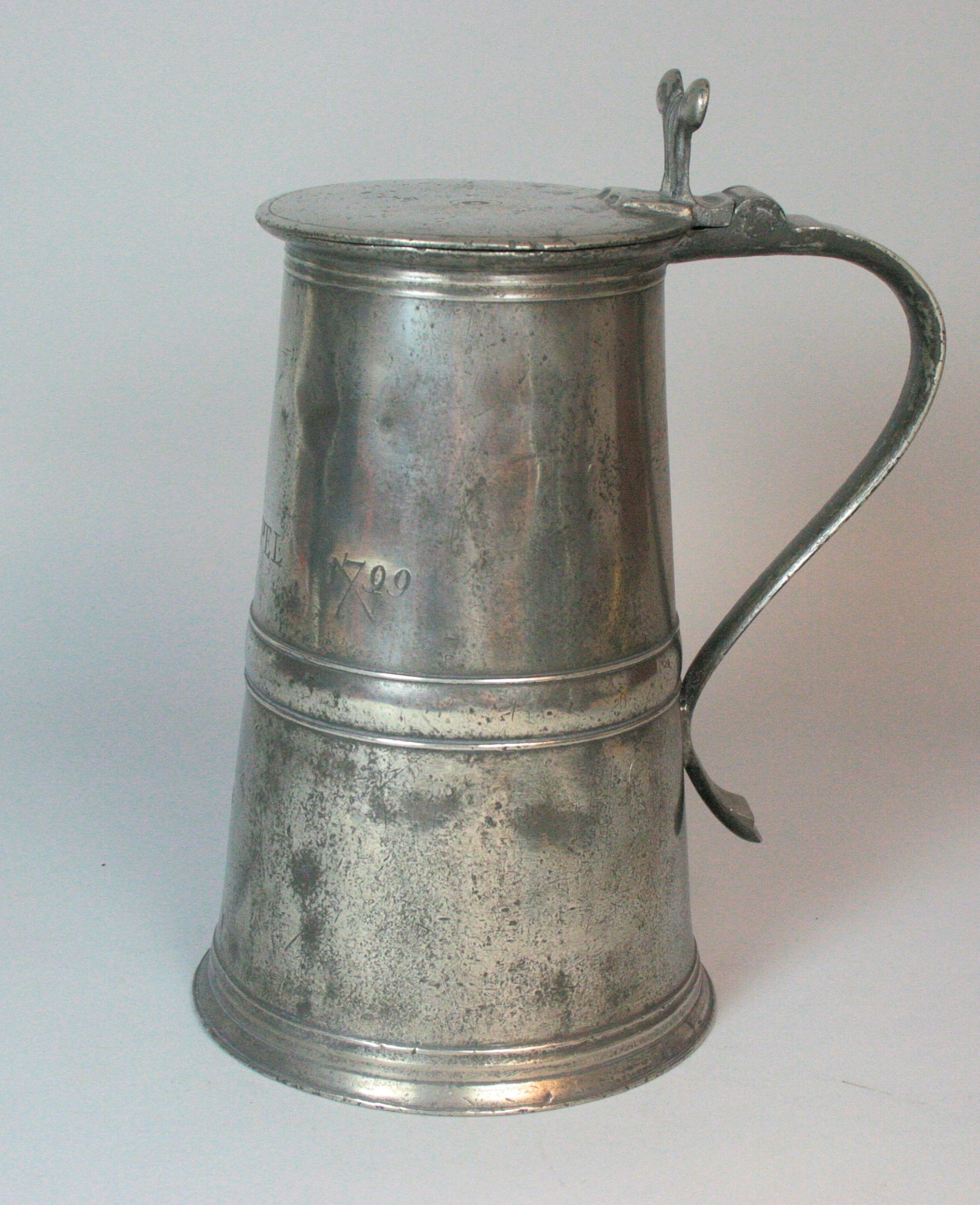 A 18th century pewter communion flagon