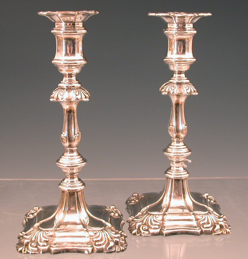 A pair of George II style table candlesticks
