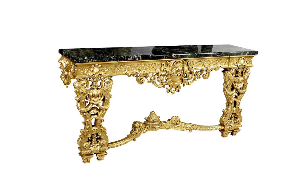 A Baroque style marble and giltwood console table Of recent manufacture