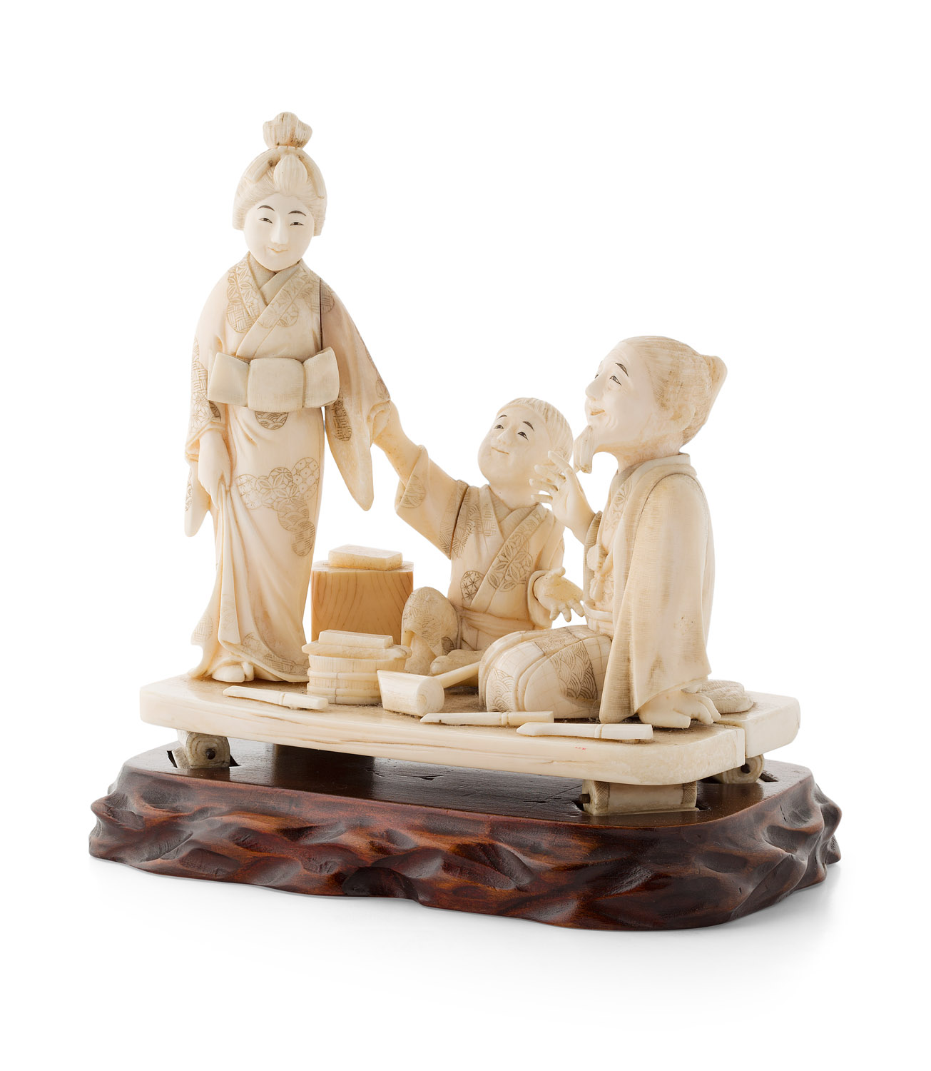 JAPANESE CARVED IVORY OKIMONO OF A FAMILY GROUP