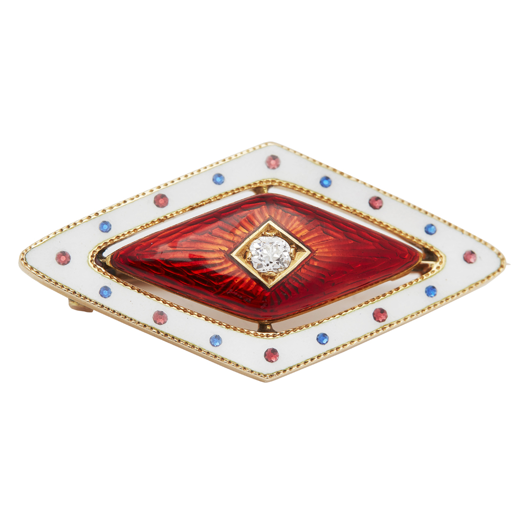 An enamel and diamond set brooch