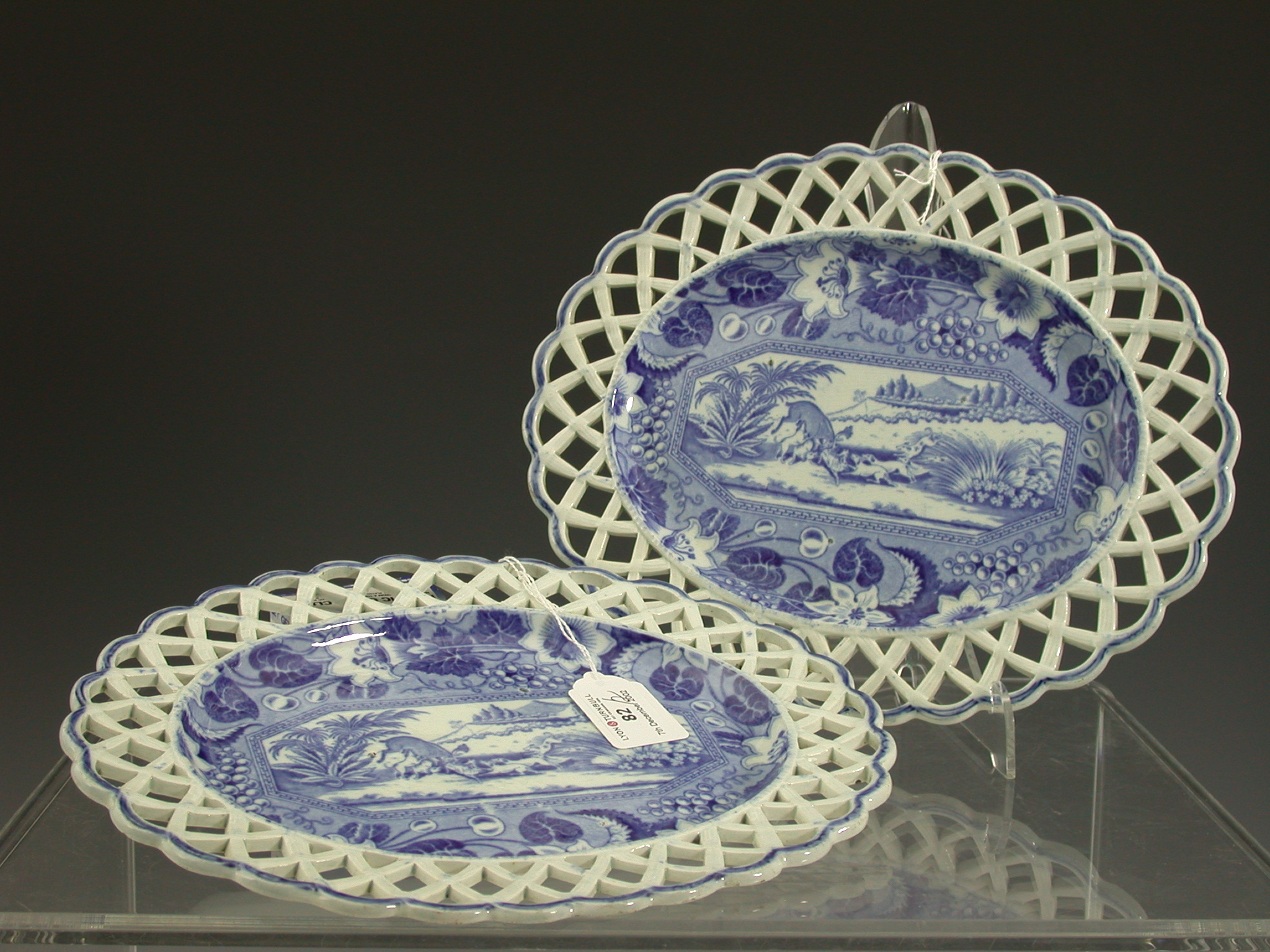 A pair of oval blue printed English sauce tureen stands