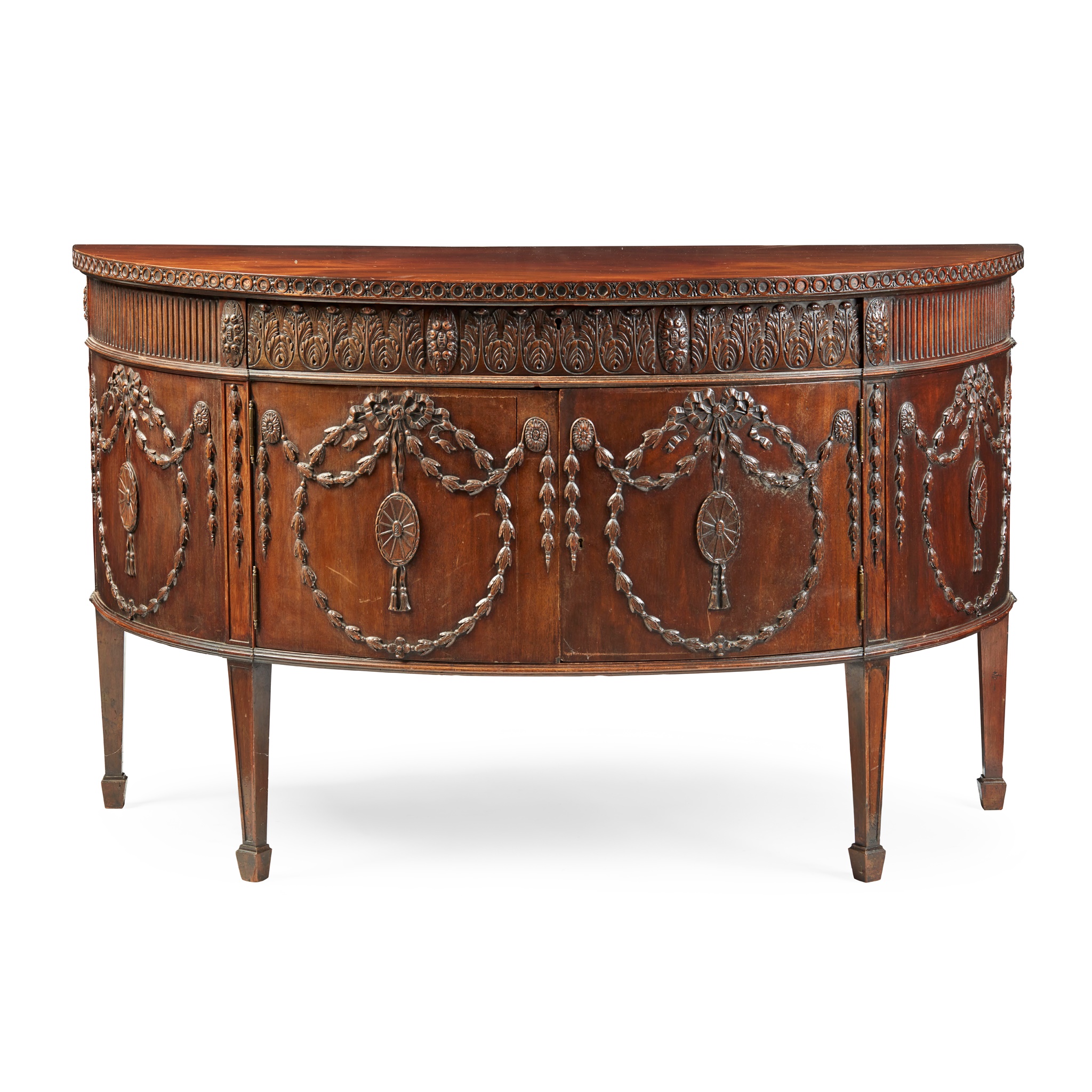 GEORGE III MAHOGANY DEMILUNE COMMODE, IN THE MANNER OF ROBERT ADAM