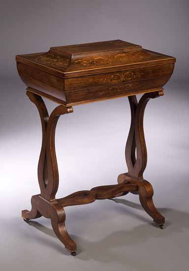 A 19th century rosewood and marquetry inlaid work table