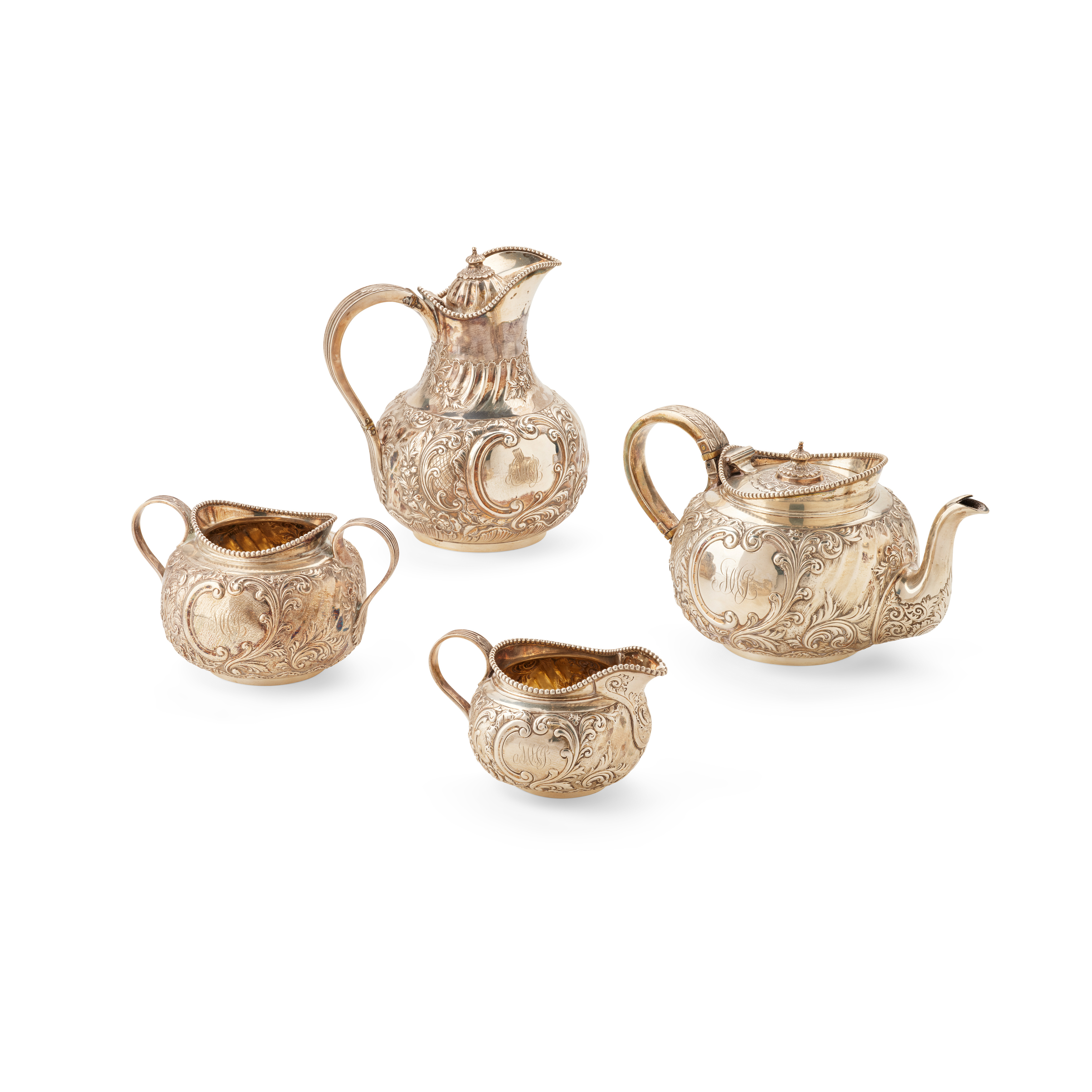 A VICTORIAN MATCHED FOUR PIECE TEA SERVICE