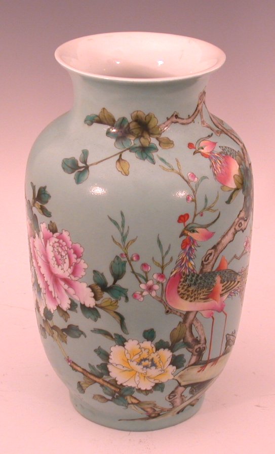 A Chinese mottled turquoise ground swollen cylindrical vase,
