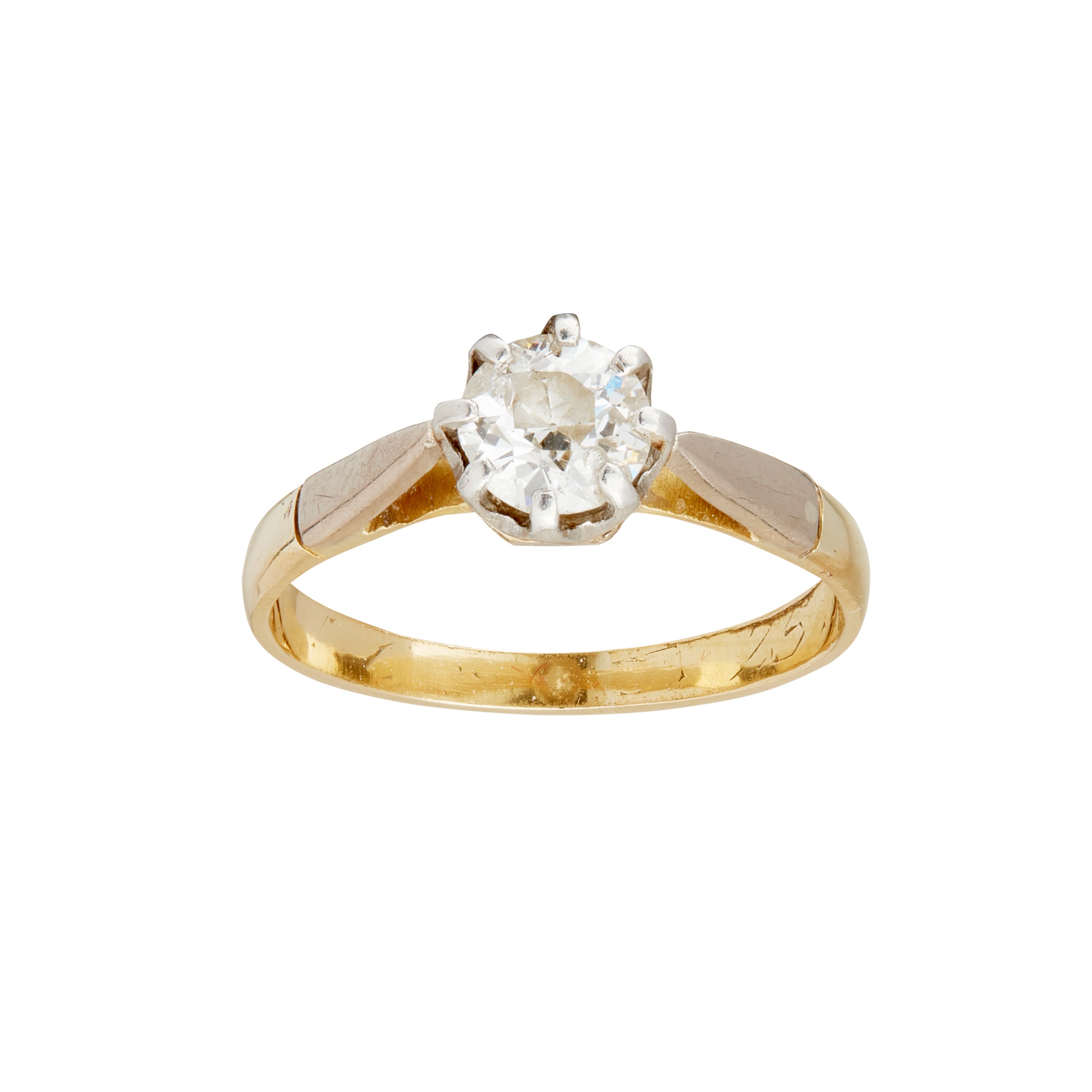 A single stone diamond ring in yellow gold