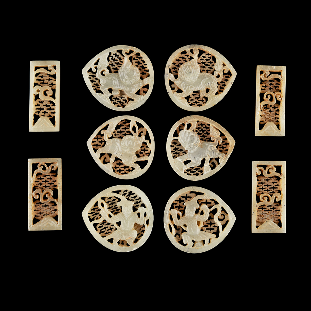 SET OF TEN CARVED AND PIERCED BELT PLAQUES