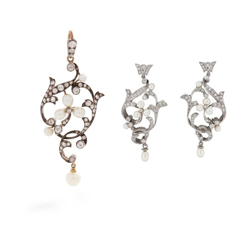 An early 20th-century pearl and diamond pendant and matching earrings