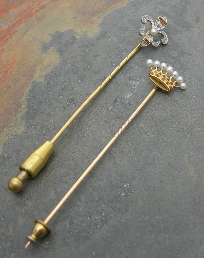 A ruby and diamond set stickpin