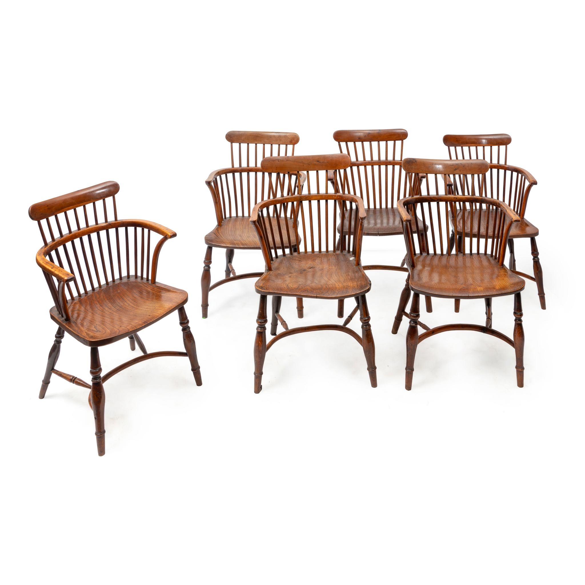 A MATCHED SET OF SIX ELM AND YEW WINDSOR TYPE CHAIRS