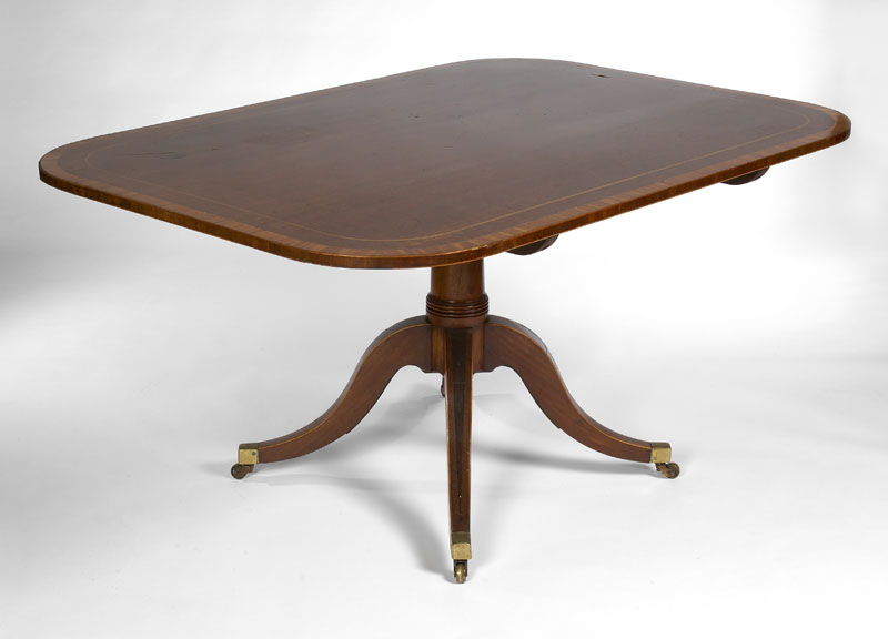 A Regency period mahogany and tulipwood crossbanded breakfast table