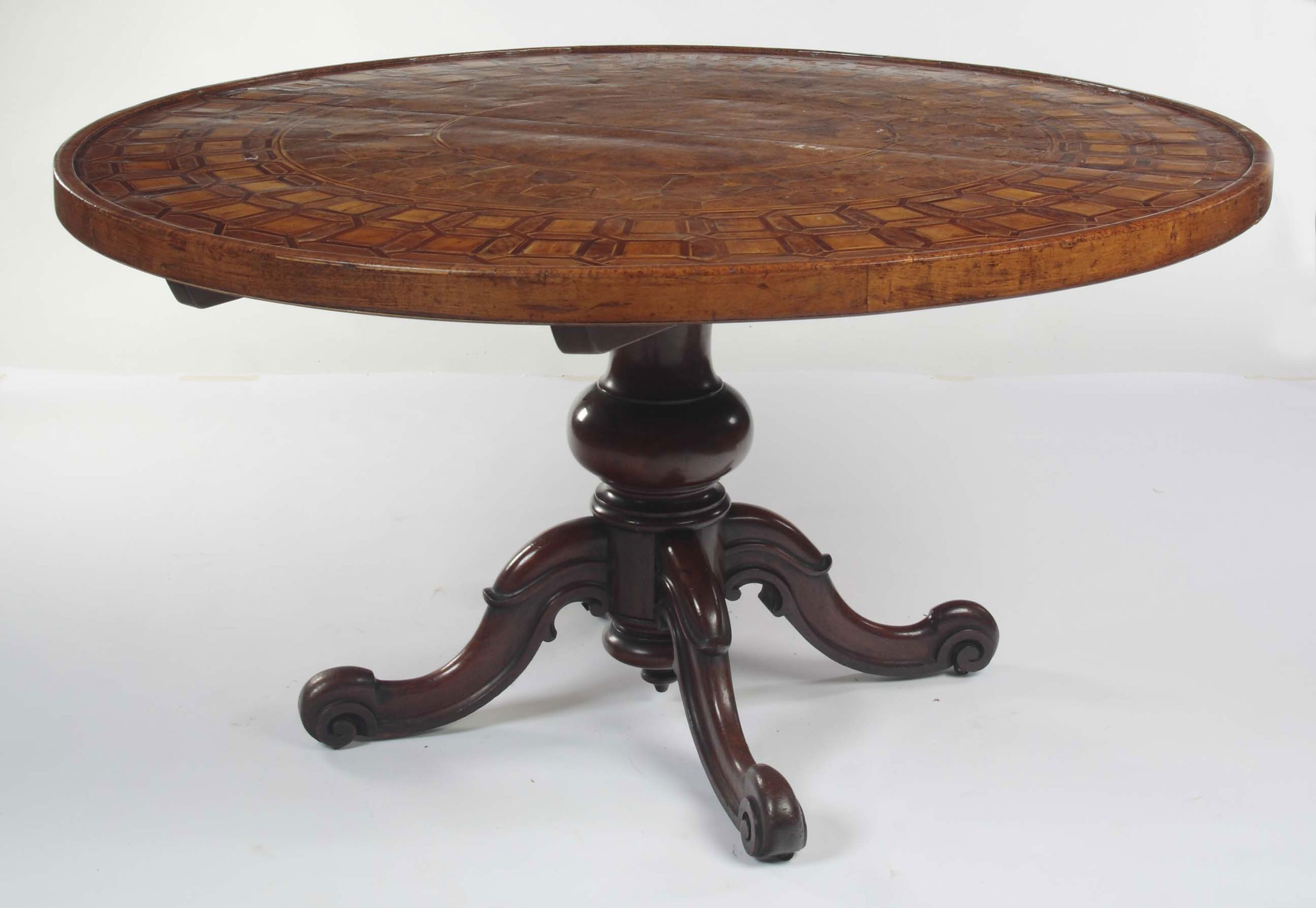 A 19th century Mongolian burr elm, walnut and parquetry circular centre table