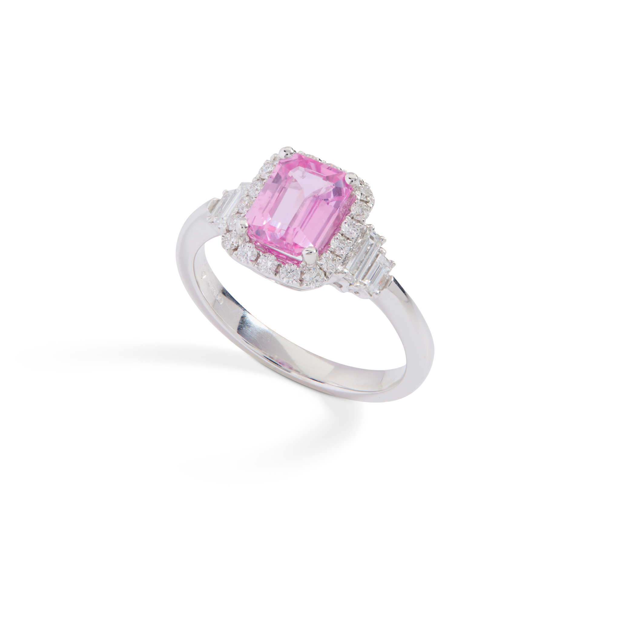 An 18ct gold pink sapphire and diamond ring