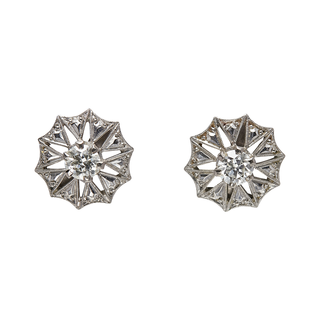 A pair of diamond set earrings