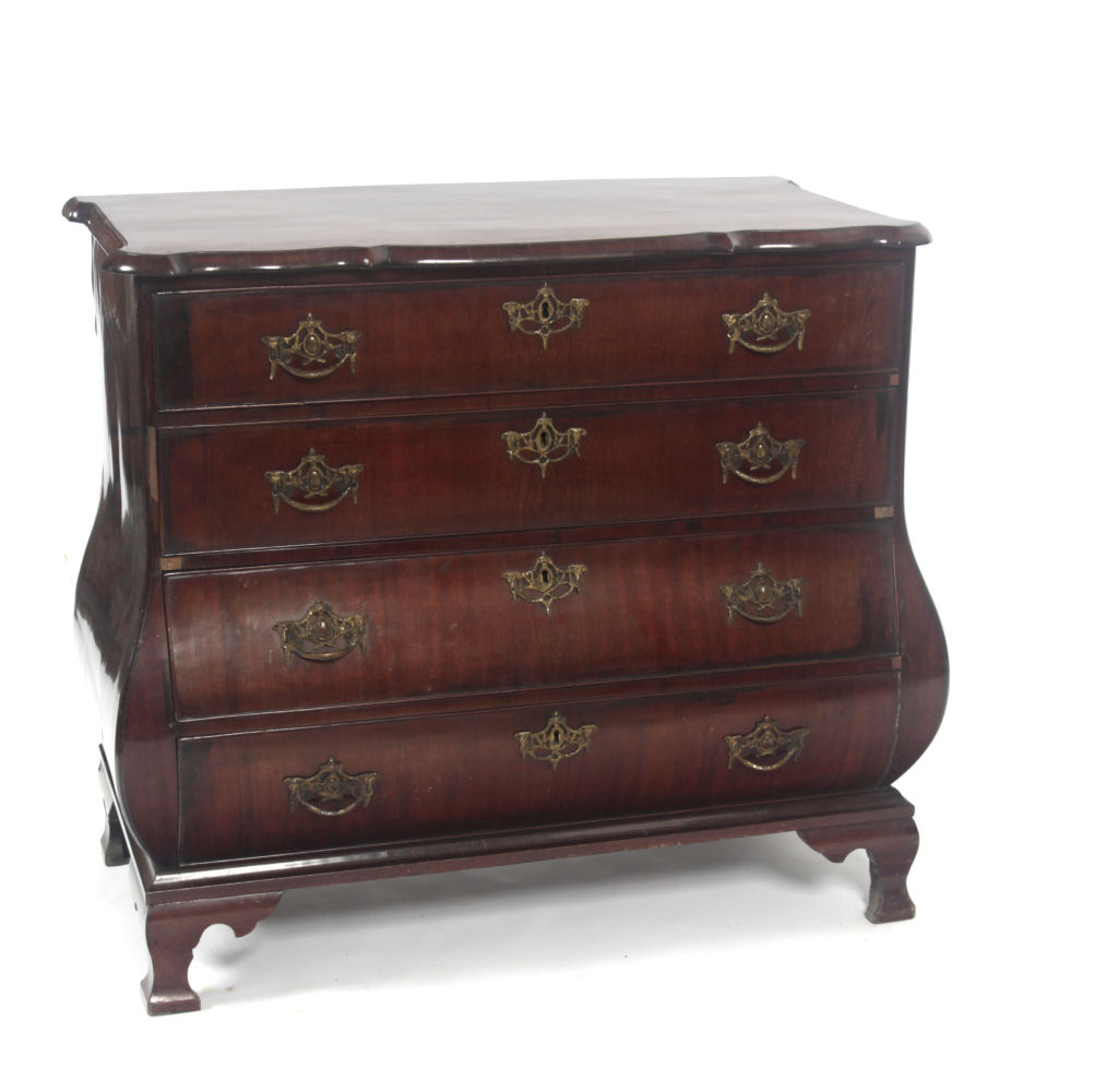 A 19th century mahogany bombe commode