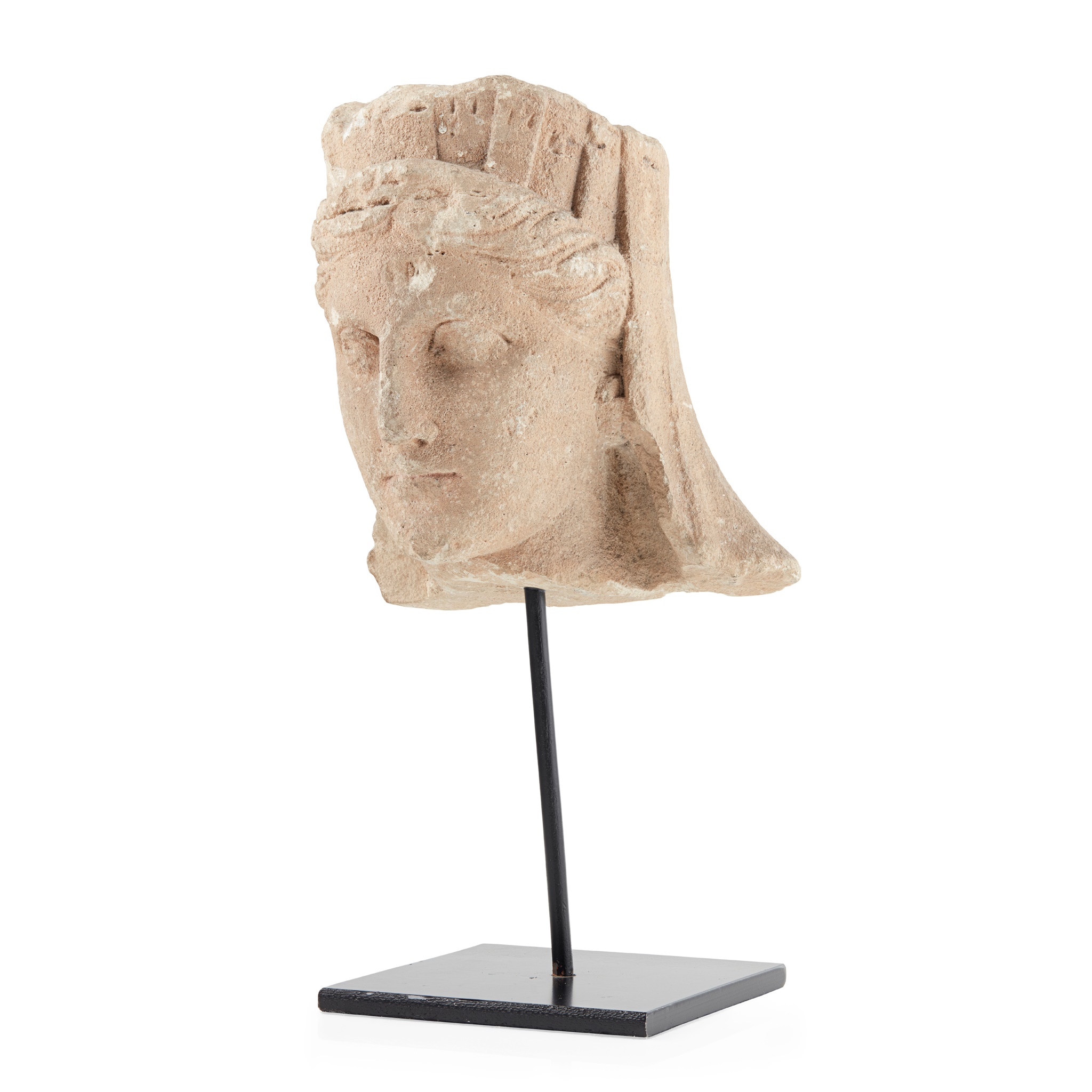 CYPRIOT LIMESTONE HEAD OF A GODDESS, LIKELY APHRODITE