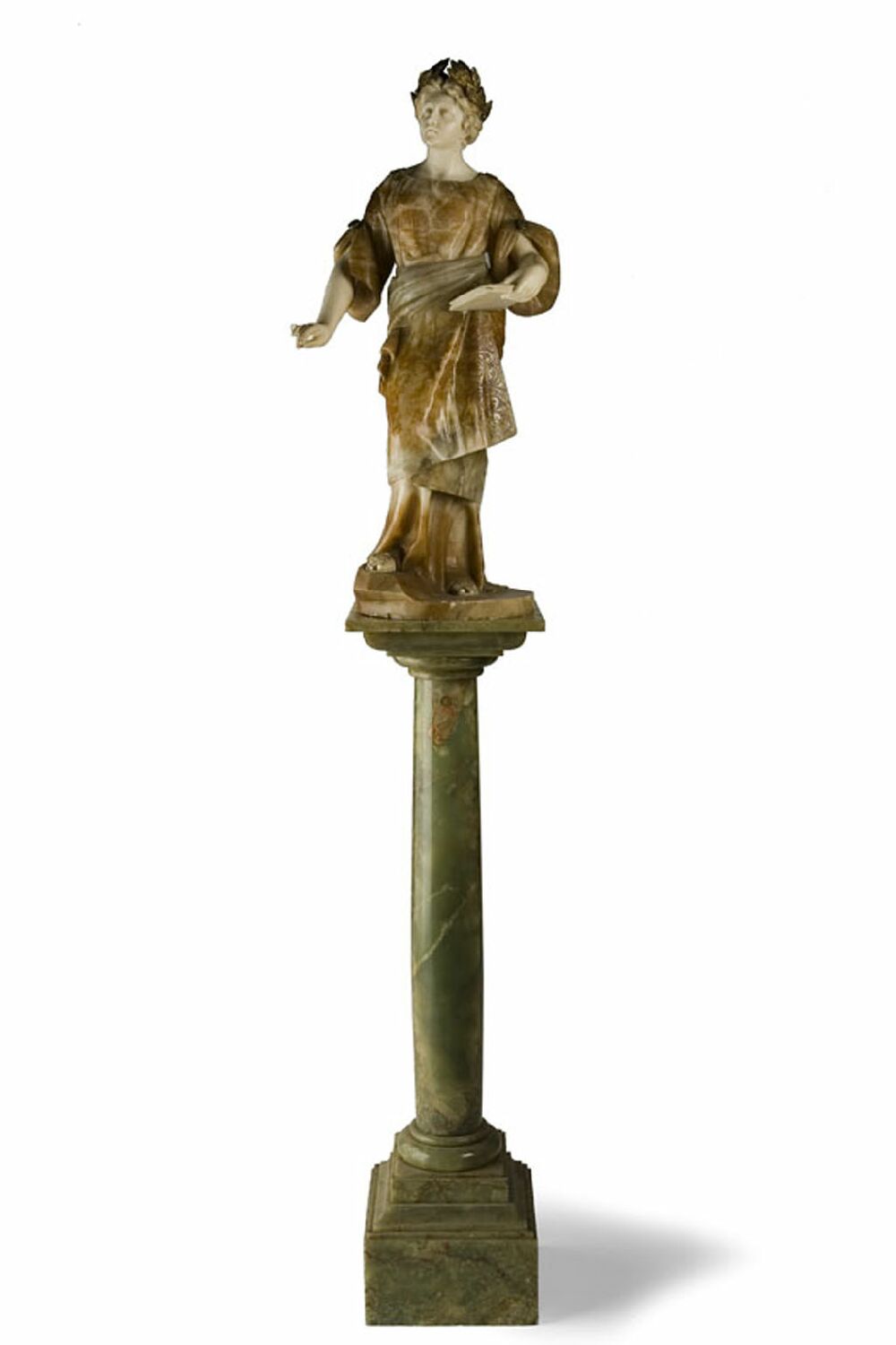 A 19th century French onyx and marble figure of a classical muse