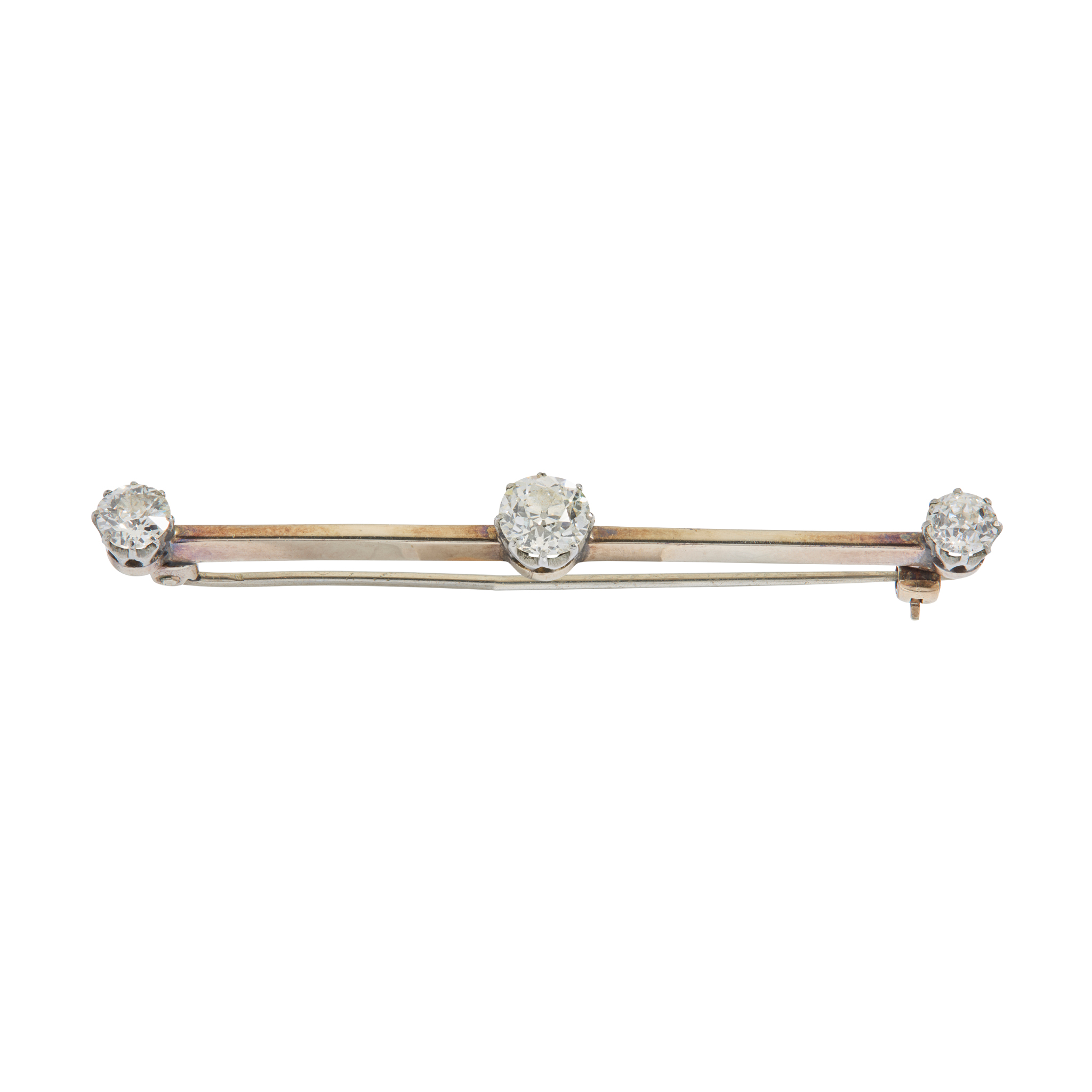 A diamond three-stone bar brooch