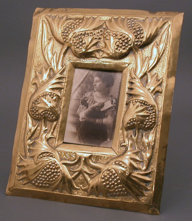 A Scottish school brass picture frame