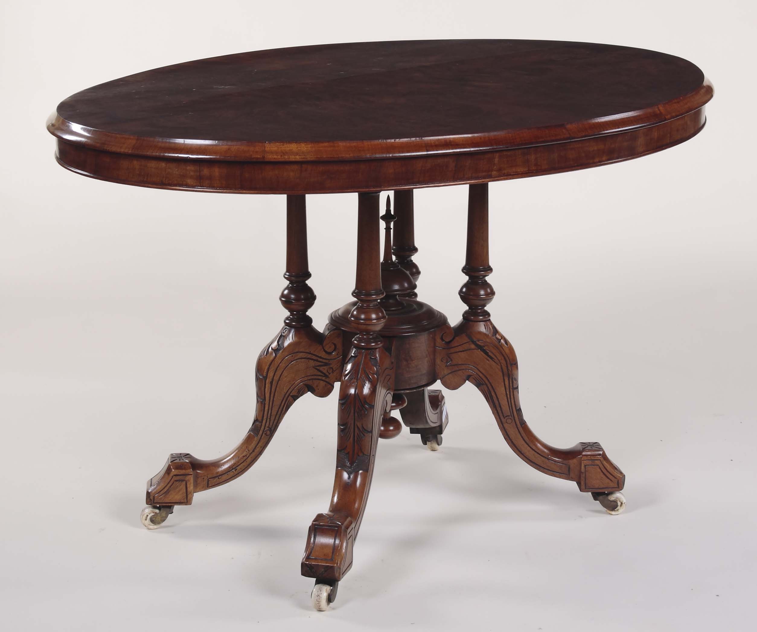 A Victorian burr walnut loo table