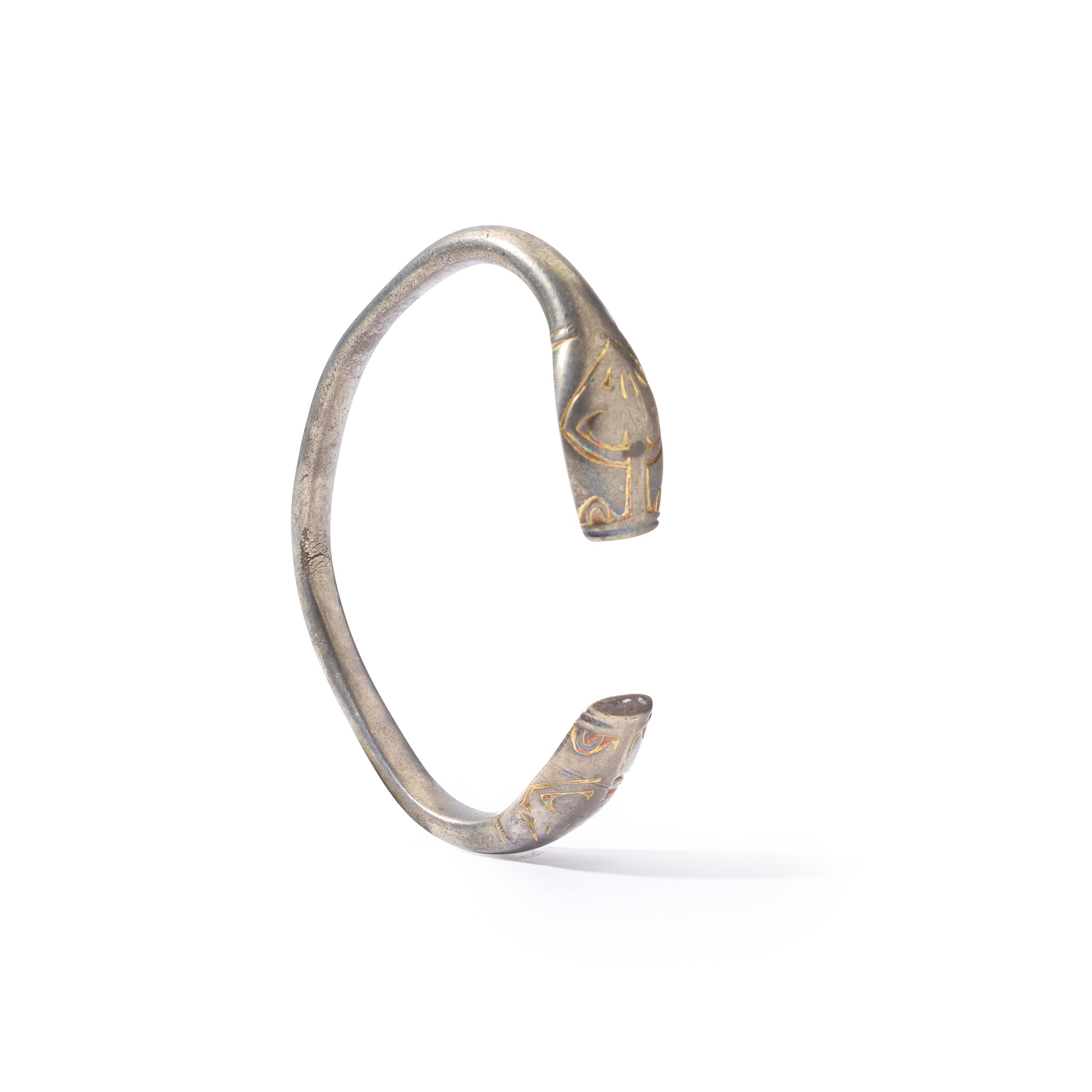 A Migration Period silver and gilt animal head bracelet,