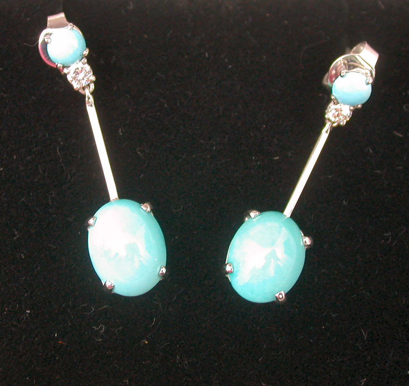 A pair of turquoise and diamond pendant earrings,
