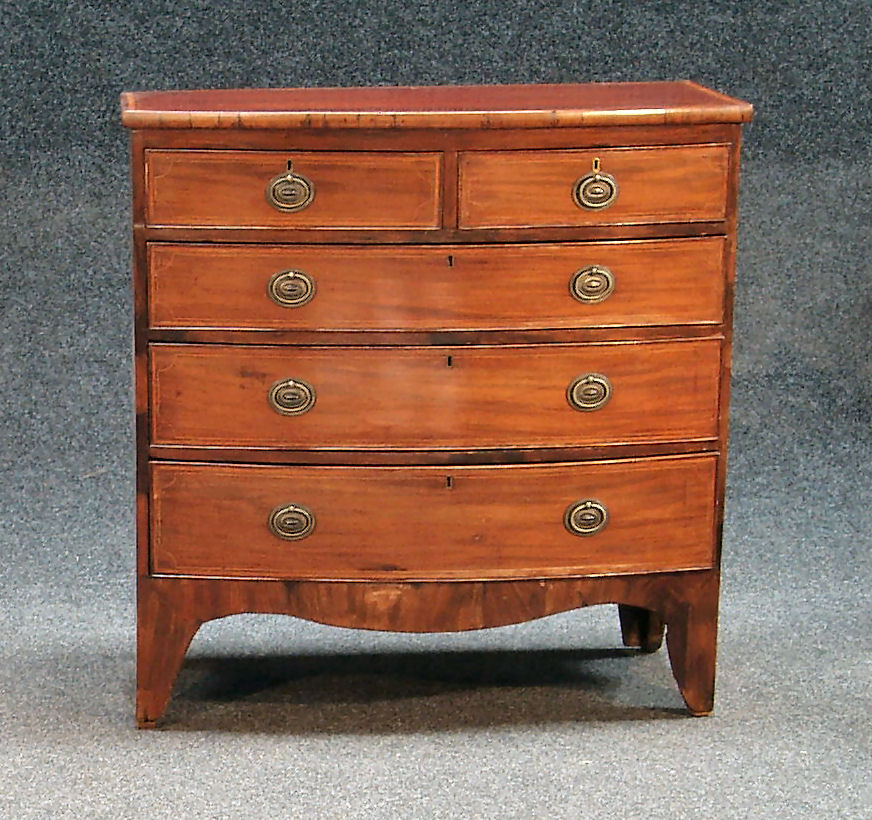 A Georgian bowfront chest,