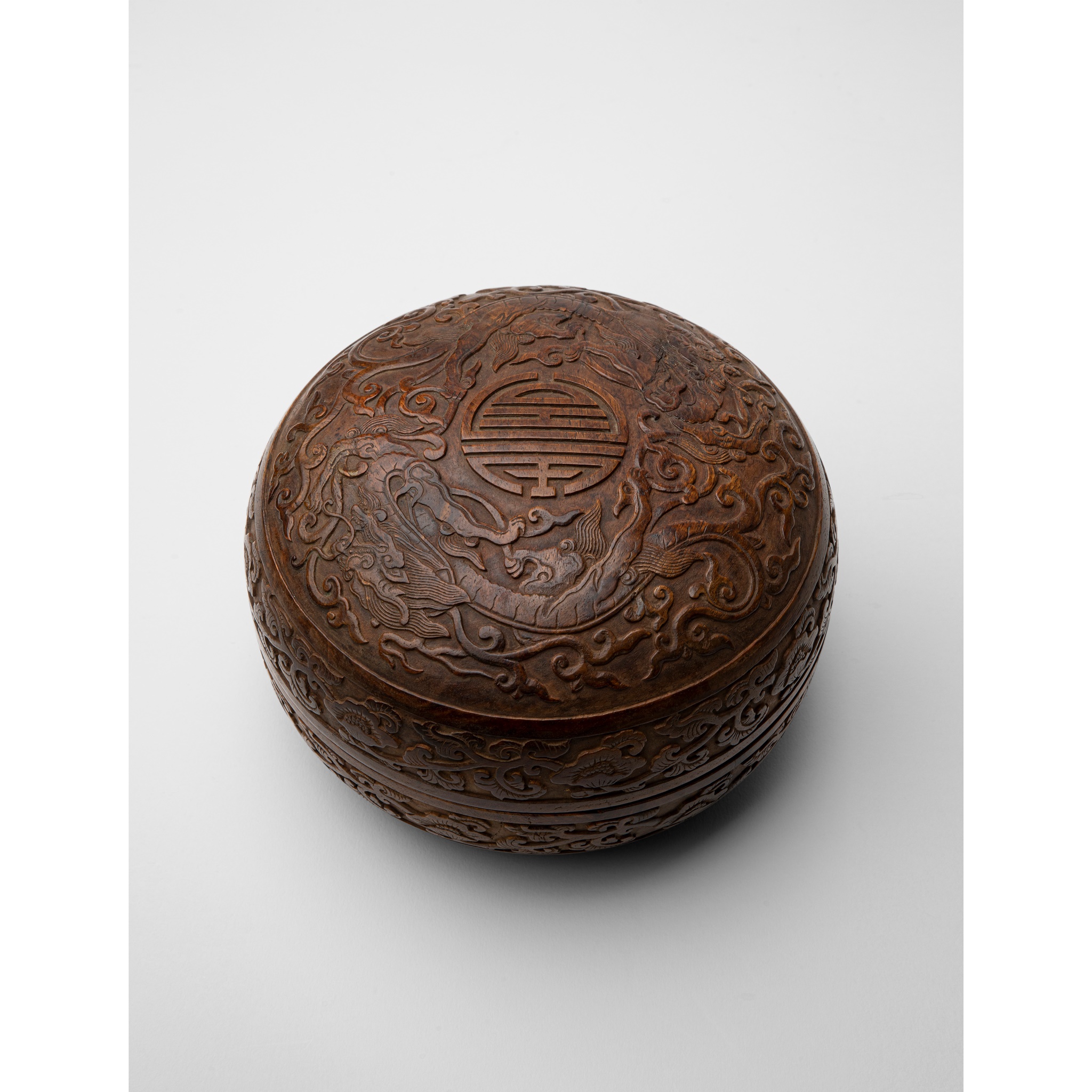 HUANGHUALI CARVED 'DRAGON' CIRCULAR BOX AND COVER