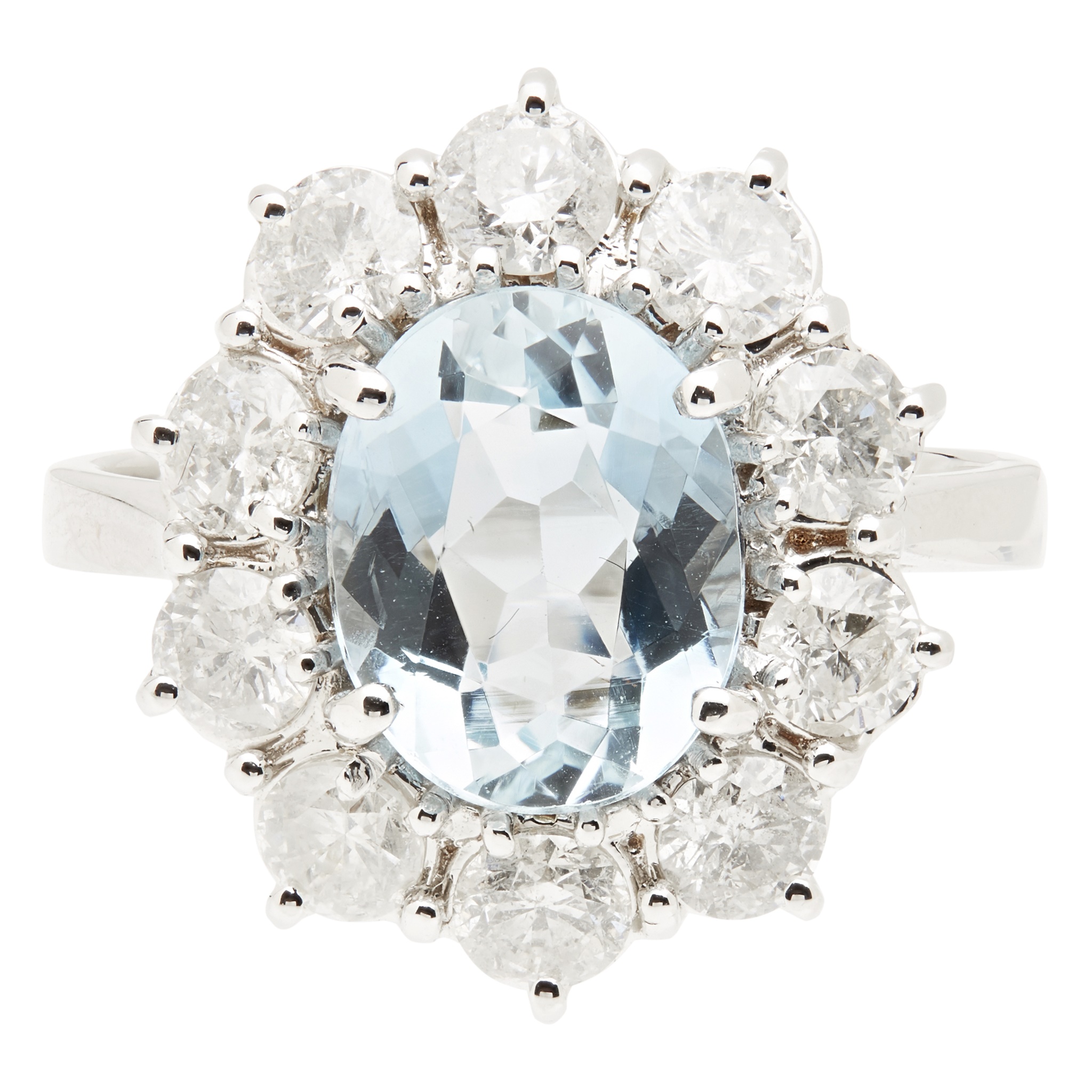 An aquamarine and diamond set cluster ring
