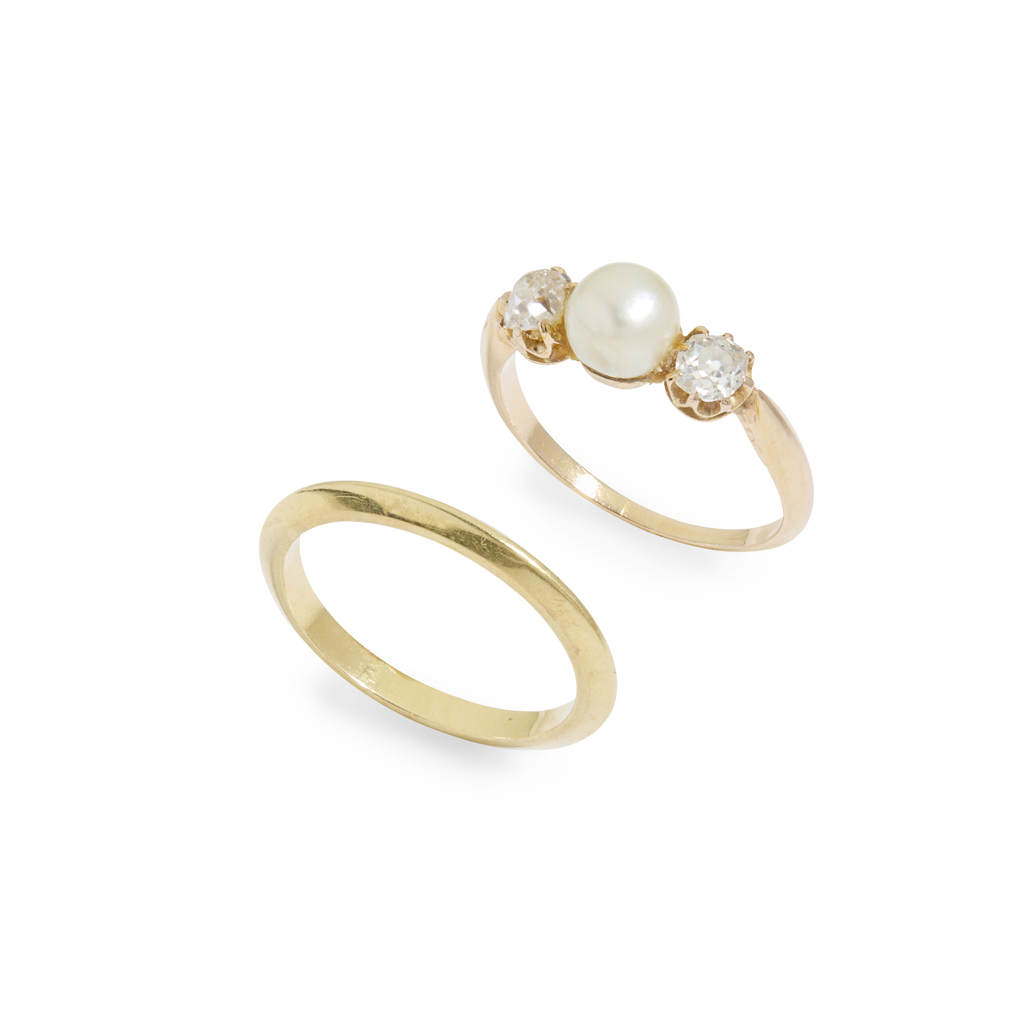 A pearl and diamond three-stone ring