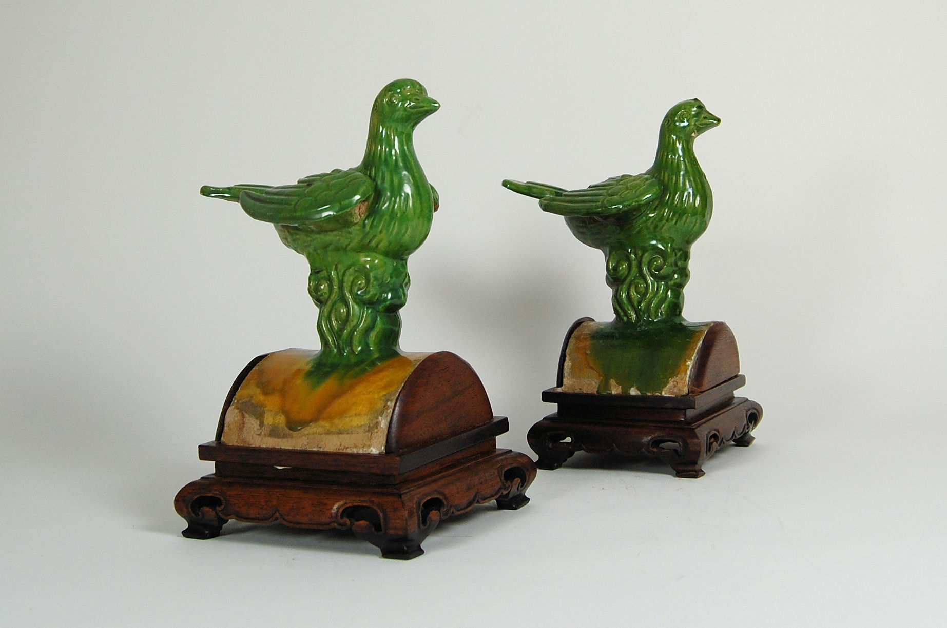 PAIR OF CHINESE BIRD FORM ROOF TILES