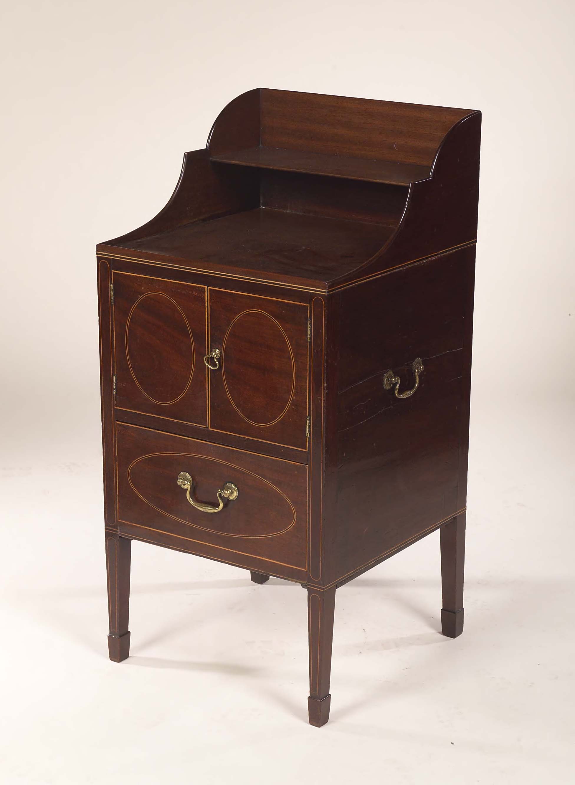 A George III mahogany bedside cabinet,